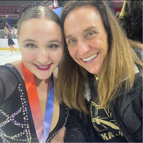 Carolin and Madison taking a selfie at an icerink