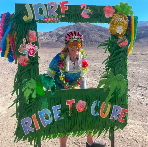 woman standing posing for a photo in the desert